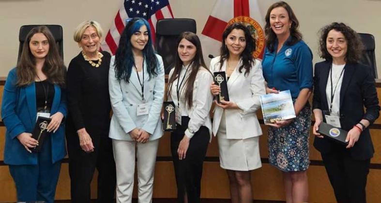 The Armenian delegation meets with Neptune Beach Mayor Elaine Brown, second from left, and Jacksonville Beach Mayor Christine Hoffman, second from right, who presented the delegates with keys to the city. (photo submitted)