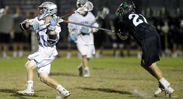 Sharks midfielder Andrew O’Dare gets ready to fire a shot on goal against the Panthers. O’Dare won a number of crucial face-offs and scored  three times to help Ponte Vedra secure its sixth consecutive district championship (photo by Rob DeAngelo)
