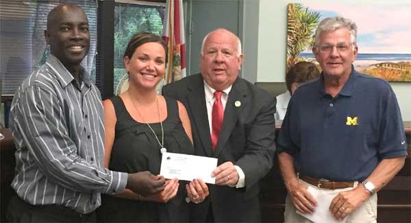 Shown are, from left, Recreation Director Timmy Johnson, Beaches Resource Center Foundation Board President Samantha DeCarlo, Mayor Mitch Reeves and Recreation Committee President Grant Healy. (photo from city of Atlantic Beach)