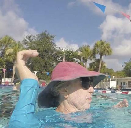June Williams is in the water teaching children to swim. (photo submitted)