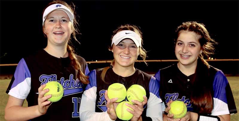 Freshman Emily Clapp, senior Dacie Watterson and freshman Tiffany Semack hit five home runs between them. (photo by Merle Watterson)