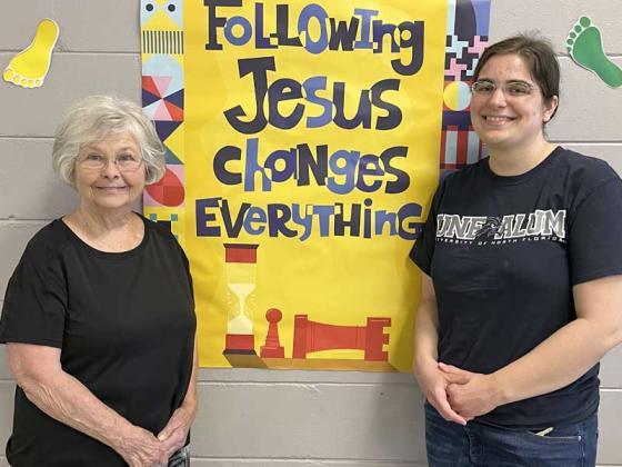 Shown are Linda Bass, left, and Reagan Earnest of One Church, Jacksonville Beach, as they prepare for 2023 Vacation Bible School. (photo by Linda Borgstede)