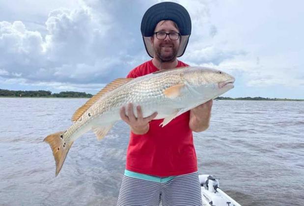 Sean Thomas with a huge St. John’s River Redfish. (photo submitted)