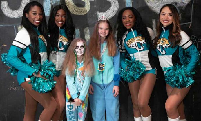 Those attending Halloween Doors & More can visit with Jacksonville Jaguars cheerleaders. (photo submitted)