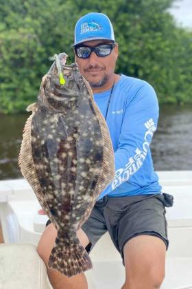 Captain Steve Crowder with a nice St. Johns River flounder he caught this week. (photo submitted)