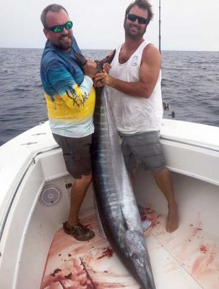Capt. Frank Vining on the Walk Thru and Steve Grant landed this massive 113-pound wahoo during the last kingfish tournament.