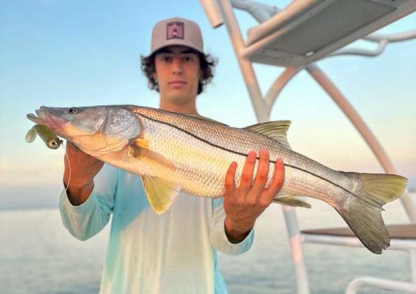 Owen Keyser with a nice sunrise surprise North Florida snook. (photo submitted)