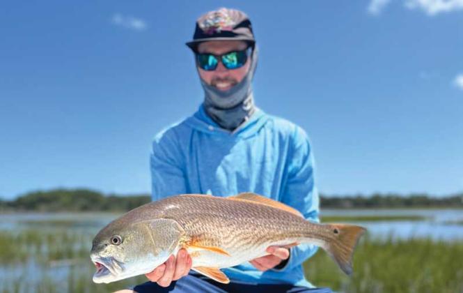 James London fooled this redfish with a Gurgler fishing the flooded grasses last week. (photo submitted)