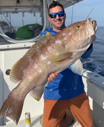 Andrew Broughton with a yellow edge grouper. (photo submitted)