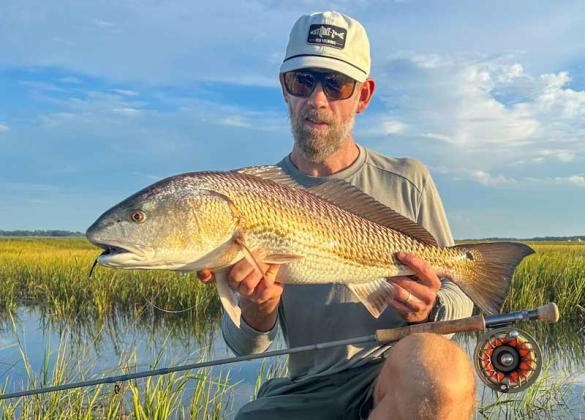 Capt. Andrew Mizell caught this healthy redfish in the flood grass last week. (photo submitted)