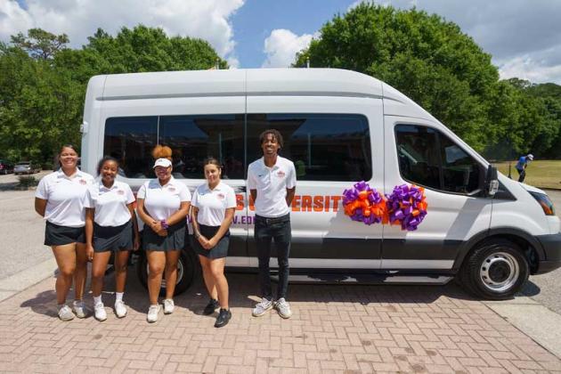 The women’s golf team at Edward Waters University receives a van from THE PLAYERS Championship. (photo by Rankin White/PGA TOUR)