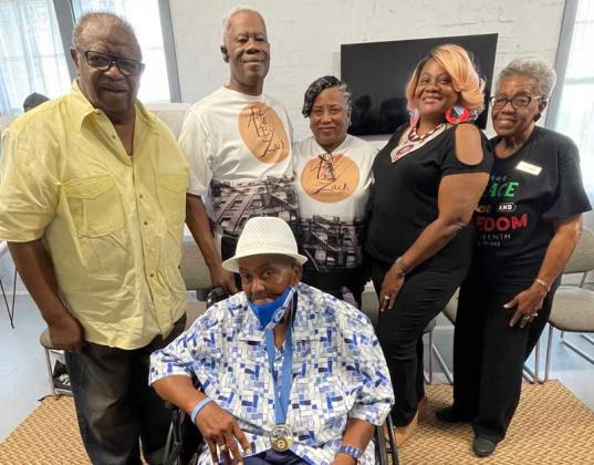 Shown are (seated) Coach Marvin “DJ Roach” Robinson, (standing, from left) James Graham, Zackary and Mrs. Pratt, Lady C and Peggy Johnson. (photo submitted)