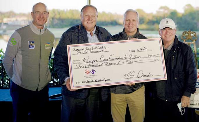 Jim Furyk, M.G. Orender, Ed Burr and Mark McCumber at check presentation at the Dream Finders Homes MBF Champions for Child Safety Pro Am Golf Tournament. (photo submitted)
