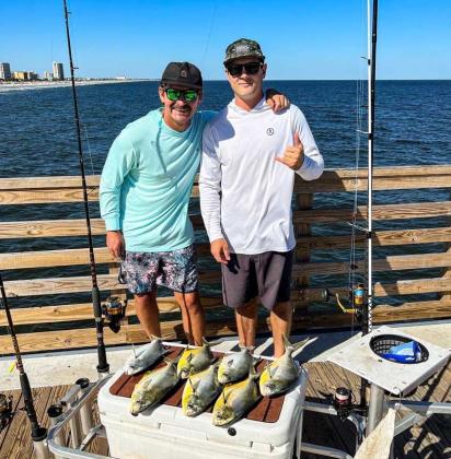 Locals Joe Pulido and Will Vought found perfect weather and hungry pompano at the pier last week. (photo submitted)