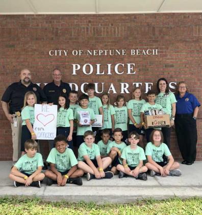 Third grade students, administrators and Pastor Howard McMinn dropped off lunch donated by Jimmy John’s for the officers to enjoy. (photo submitted)
