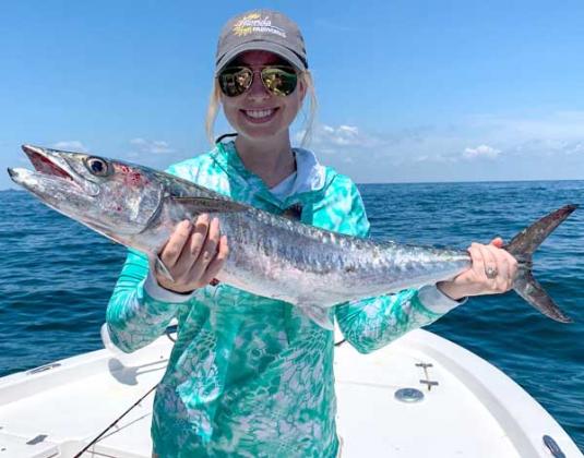 Natalie Sullivan with her summertime kingfish. (photo submitted)