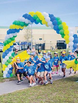 Palm Valley Academy students participate in a fun run as a fund raiser for the school.