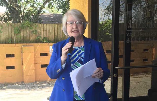 BEAM Executive Director Lori Richards welcomes guests to the grand reopening of the renovated Mayport Pantry and Service Center on Mayport Road. (photo by Linda Borgstede)