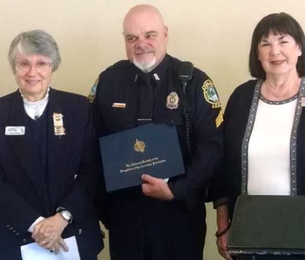 Atlantic Beach Patrol Sgt. Lenny Jevic receives the 2015 Beaches DAR Public Servant Armed Forces Veteran Award last month from Alice Stratton (left) and Sylvia Millard. (photo submitted)