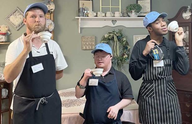 Shown are, from left, Keaton Bicknell, Josh Rickert and Conner Davis in the Cup of Dreams Tea Room at PossAbilities Plus. (photo submitted)