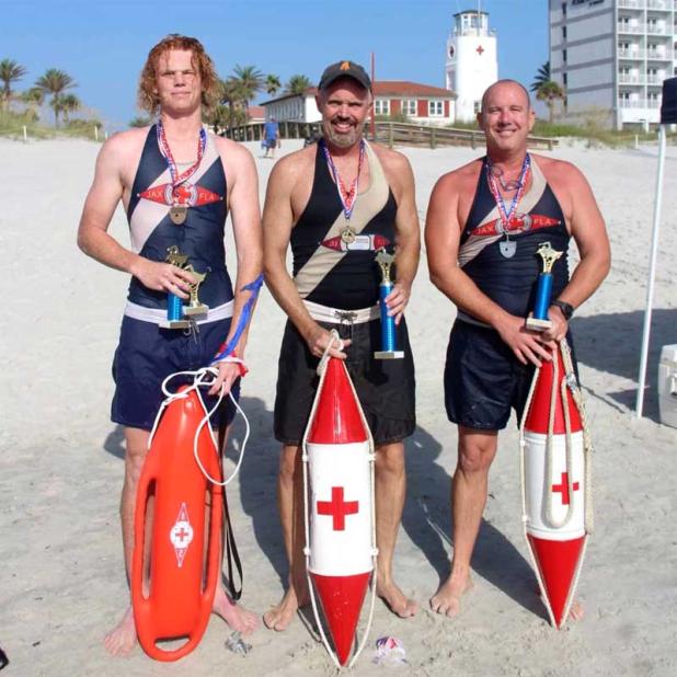 First place winner Cleve Cooney, center, is flanked by third place finisher Michelangelo Porter, left, and second place finisher Bill Horn, right. (photo submitted)