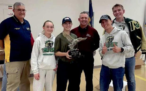 Nease NJROTC’s air rifle team receives the second place trophy at the Area-12 Championships Jan. 22 in Anniston, Ala. Shown are Area-12 Manager Johnathan Shaw, Chloe Westerlind, Team Captain Hailey Pitches, Gunnery Sgt. Duane Hanson, Gabriel Mitchell and Nicholas Bohanon. (photo submitted)