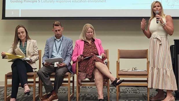 Victoria Schultz, Corey Wright, Dr. Dana Kriznar and April Carney at the Beaches Watch meeting.