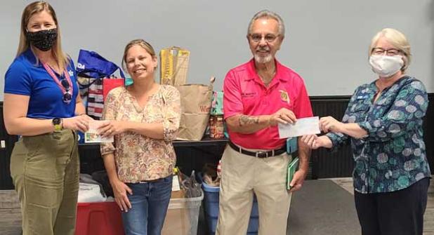 BEAM's Director of Development Gracie Simendinger, Post 129 Canteen Manager Brandi Haught, Post 129 Commander Joe Maichle and BEAM's Executive Director Lori Richards. (photo submitted)