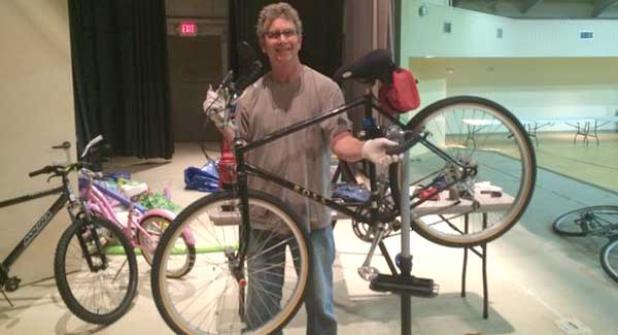 Jim Simmons and his team repair bicycles in a partnership with Mission House.