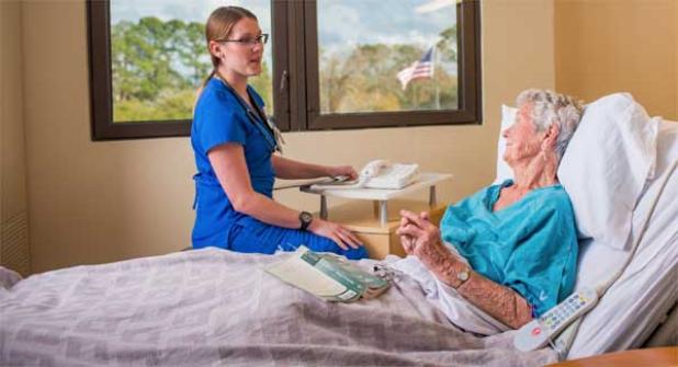 A new unit to focus on the needs of older patients has opened at Baptist Medical Center-Beaches. Registered nurse Jennifer Stalmann cares for patient Anne Thompson. (photo submitted)