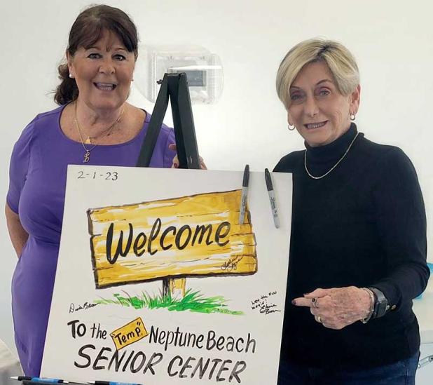 Neptune Beach Senior Activity Center Executive Director Leslie Lyne and Neptune Beach Mayor Elaine Brown mark the opening of the center's temporary location at Neptune House in Jarboe Park. (photo by Liza Mitchell)