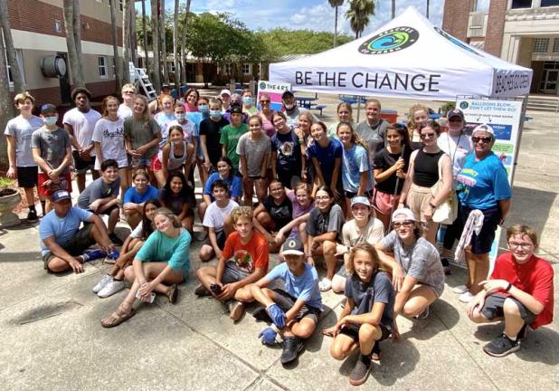 Volunteers gather to help clean up Fletcher Middle School. (photo submitted)