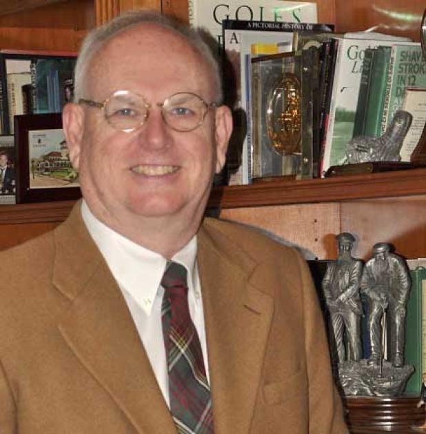 Billy Dettlaff in the library of his Marsh Landing home, which is a veritable museum of golf memorabilia. (photo submitted)