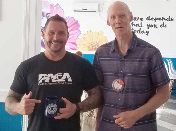 Christian Griffith, left, and Beaches Exchange Club President Jim Hanson. (photo submitted)