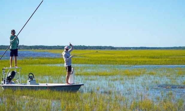 Capt. Matt Chipperfield enjoys some time on the bow of his skiff instead of the platform. (photo submitted)