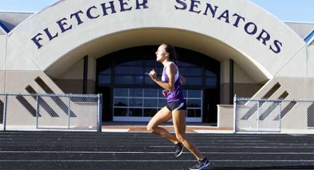 Senators distance runner Kayley DeLay won the 1,600 meters at Fletcher’s home meet, then went on to win that event as well as the 800-meter and 3,200-meter races during the Gateway Conference track and field championships. (photo by Rob DeAngelo)
