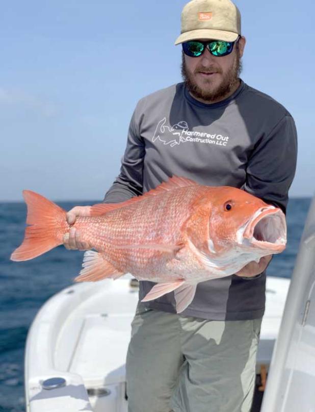 Ryman Koester with a healthy red snapper.