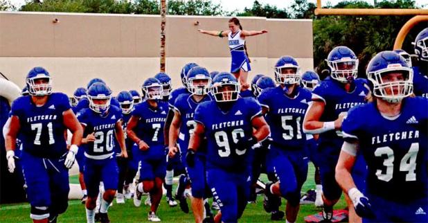 The Fletcher High School Senators take to the field to start their game against Chiles. (photo by Jeanell Wilson)