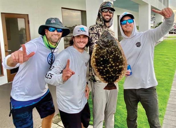  Team Mike and Mike with the winning flounder. Shown are Mike Feci, Mike Haan, Colin Phillips and Will Pujadas. (photo submitted)