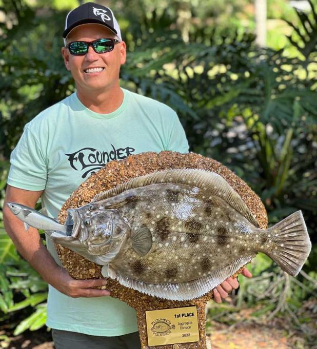 Chip Davis holds the custom trophy designed by Brian Murphy for the Flounder Pounder for Autism Tournament. The tournament will be held Saturday. (photo courtesy of Chip Davis)