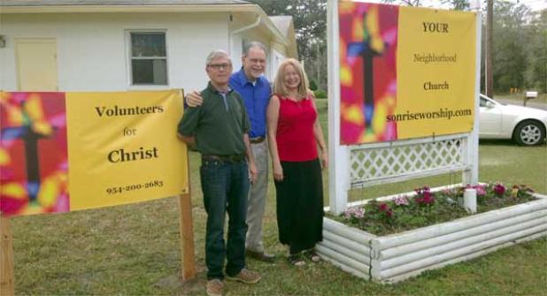 Bobby Cobble, Rev. Jerry Curtis and Debbie Simmons celebrate the ministry of Sonrise Worship Center, 600 Levy Road.