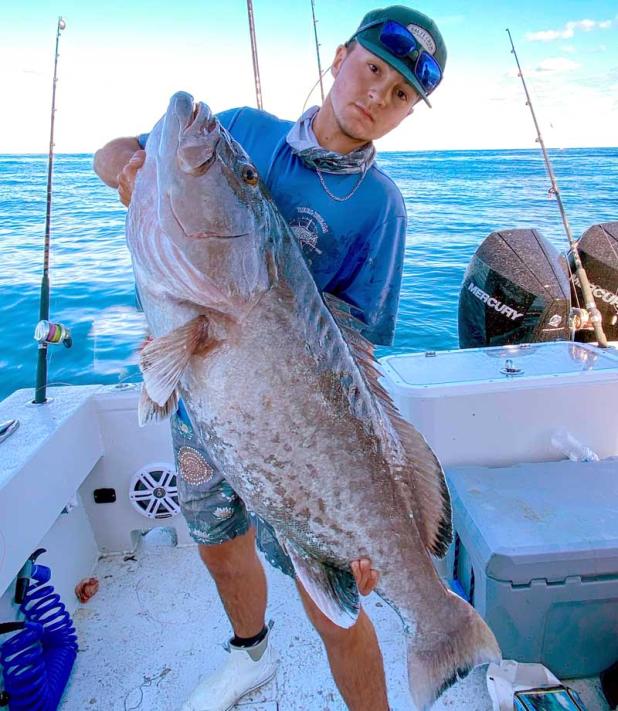 Deckhand Preston set the bar high with the first gag grouper on the new Reel Dream. (photo submitted)