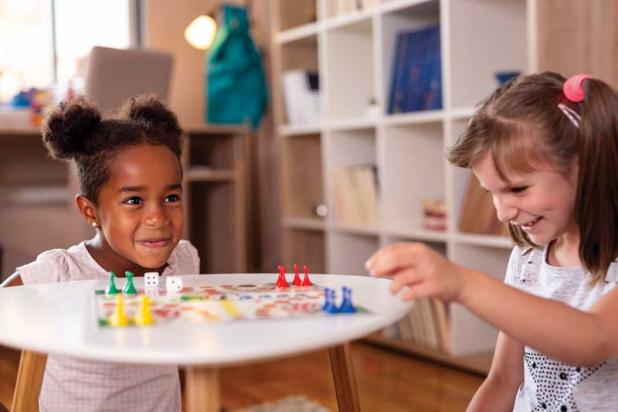 Playing games can help children learn to take turns and count.