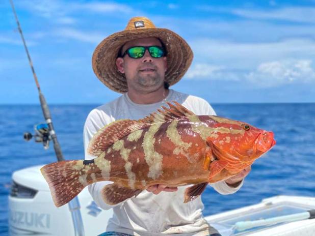 Ryan Flowers with a Nassau grouper caught off Mayport. (photo submitted)