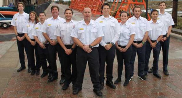 Staff officers of the Jacksonville Beach Volunteer Life Saving Corps, from left, Reed Pilcher (1st registrar), Nicole Emerson (3rd mate), Josh Singletary (2nd mate), Dan Leonard (1st mate), Max Ervanian (lieutenant), Bill Horn (captain), Ryan Karish (instructor), Kaitlin Whited (asst. instructor), Travis Blakeslee (1st quartermaster), George Alverio (2nd quartermaster) and Alex Pilcher (1st registrar). (photo by Johnny Woodhouse)
