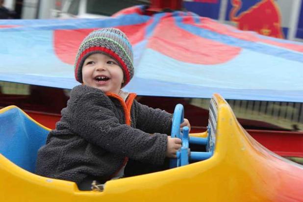 The festival will feature kids' rides in addition to food and an arts and crafts village. (photo from lionsfestival.com)