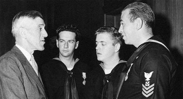 U.S. Sen. Leverett Saltonstall of Massachusetts congratulates Coast Guard Petty Officer 1st Class Bernie Webber (right), Seaman 1st Class Richard P. Livesey (second from right) and Petty Officer 3rd Class Andy Fitzgerald during the Treasury Department’s Gold Lifesaving Medal ceremony in May 1952. (U.S. Coast Guard photo)