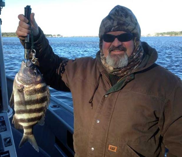 Raymond Jones with a nice sheepshead caught with Captain Dave Sipler. (photo submitted)