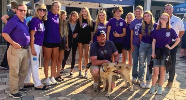Fletcher High School Interact Club members and faculty sponsors at a previous Night For The Warriors event. (photo submitted)