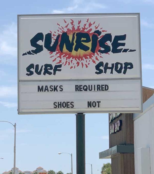 The county-wide directive requiring masks includes businesses at the Beaches such as Sunrise Surf Shop. (photo by David Bailey)
